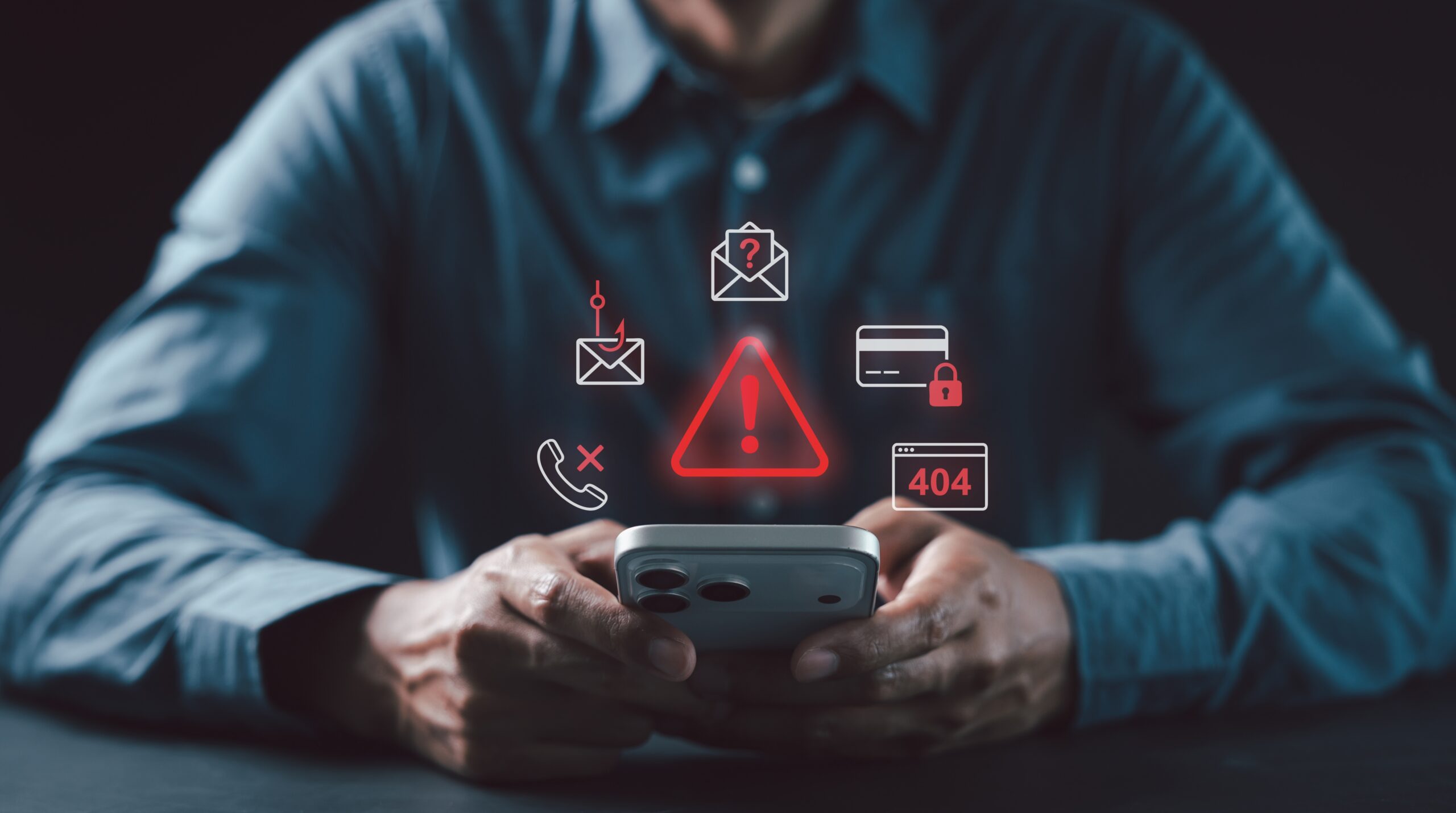 Man using smartphone with financial warnings above